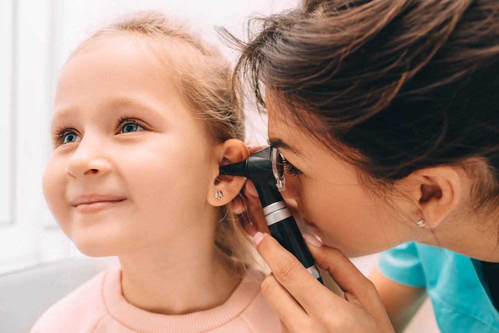 pediatrician-examining-little-patient-otoscope-hearing