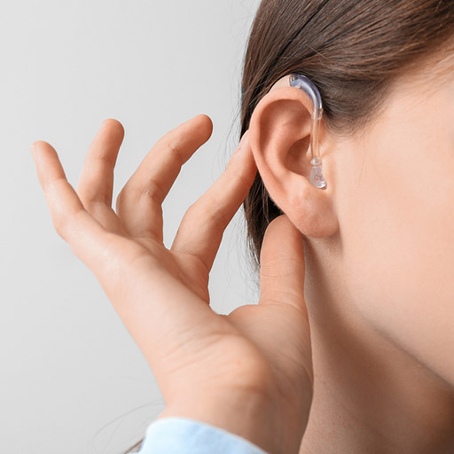 woman-checking-hearing-aids