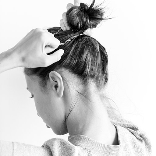 woman-making-hair-bun
